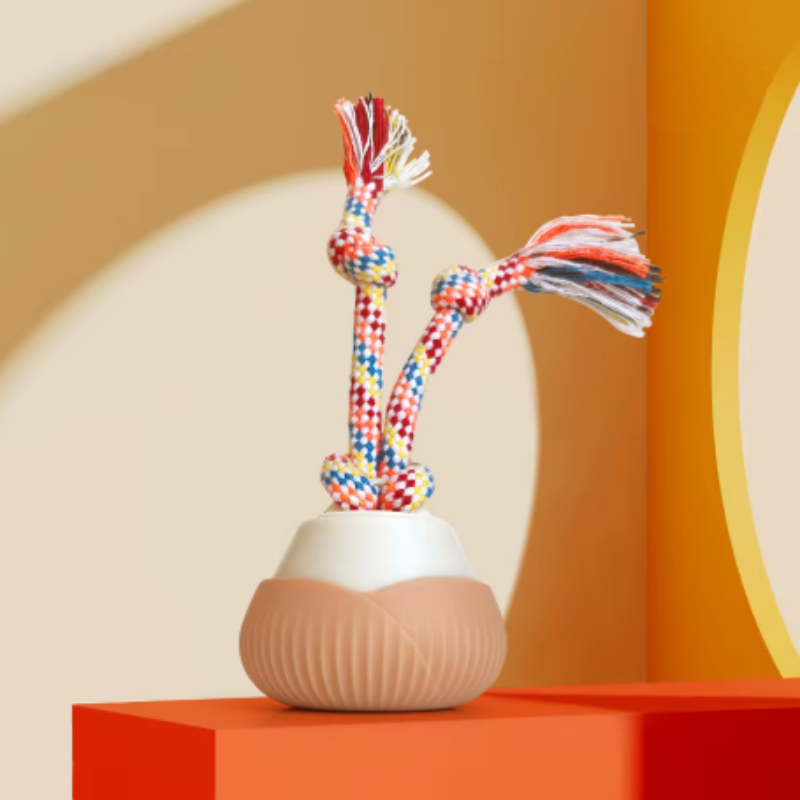 Orange interaktiv kattleksak med snören 