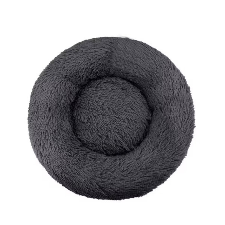 Svart rund fluffig hund och katt säng